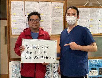 腰痛持ちの患者と